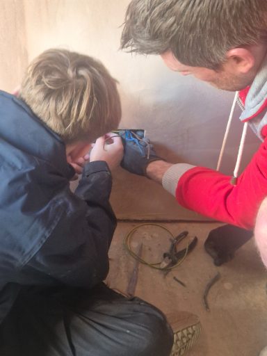 Student at Oakmoor AP learning to wire a domestic electrical socket under expert supervision